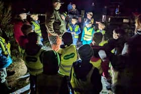 The Elvington Scout Group exploring the area in their hi-vis vest from Specsavers Acomb