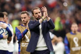 AL KHOR, QATAR - DECEMBER 10: Gareth Southgate, Head Coach of England, applauds fans after the 1-2 loss during the FIFA World Cup Qatar 2022 quarter final match between England and France at Al Bayt Stadium on December 10, 2022 in Al Khor, Qatar. (Photo by Richard Heathcote/Getty Images)