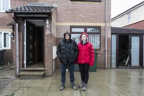 Chris Lloyd, 55, and Sophie Skidmore, 31, stand outside their property. Residents of Catcliffe and Rotherham Council start the clean of their properties after the damage caused by Storm Babet, pictured in Catcliffe, South Yorks, Oct 24 2023.