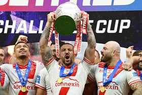 Hull KR captain Elliot Minchella lifts the trophy aloft at Wembley. (Photo: Allan McKenzie/SWpix.com)