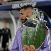 Real Madrid's French forward Karim Benzema carries out the Champions League trophy prior to the UEFA Super Cup football match between Real Madrid vs Eintracht Frankfurt in Helsinki, on August 10, 2022. Picture: JAVIER SORIANO/AFP via Getty Images.