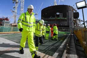 Prime Minister Boris Johnson tours the Hinkley Point C site with managing director Stuart Crooks on April 07, 2022 in Bridgwater, England. (Photo by Finnbarr Webster/Getty Images)