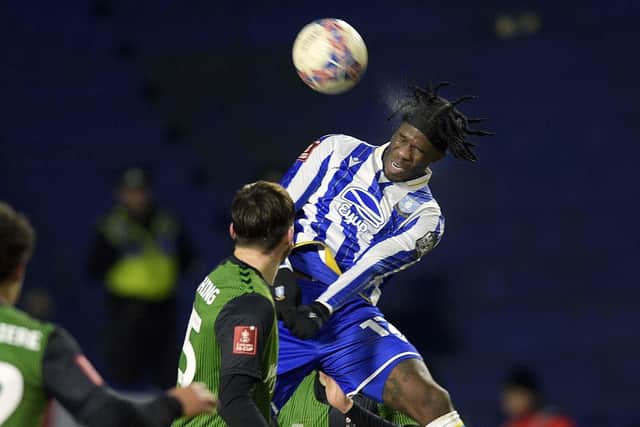 Sheffield Wednesday's Ike Ugbo rises highest against Coventry City on Friday night (Picture: Steve Ellis)