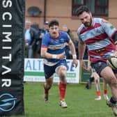Callum Bustin, right, crosses under pressure from a Sheffield player as Rotherham Titans ran in five tries in the South Yorkshire derby (Kerrie Beddows/Rotherham Advertiser)