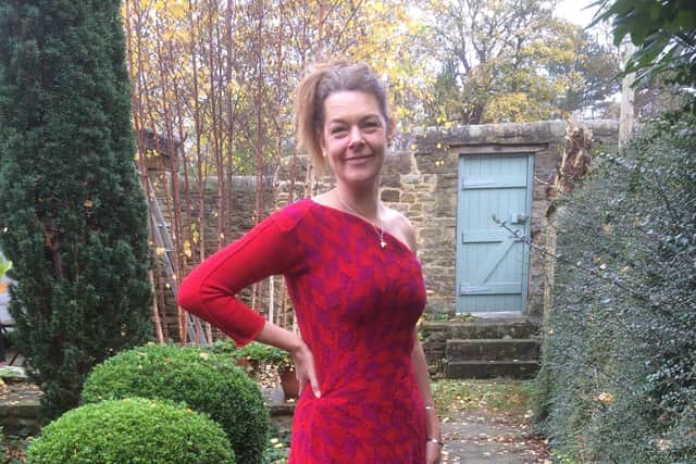 Joan’s artist friend Rachel wears a Joan Murray red and pink diamond jacquard dress and trousers, in Joan’s garden in Skipton.