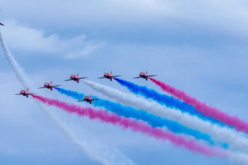 The Arrows leave their trademark red, white and blue vapour trails.
picture: Brian Murfield.