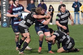 Fighting qualities: Action from earlier this season when Otley (black and white shirts) tried to stop Rotherham Titans in their tracks. (Picture: Kerrie Beddows / Rotherham Advertiser)