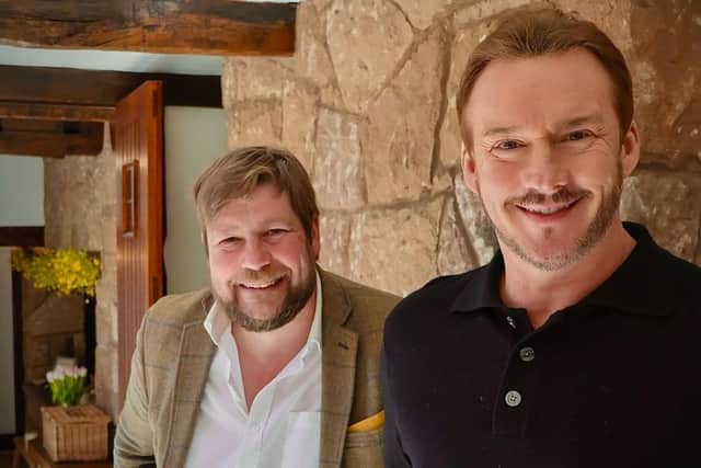 Singer Russell Watson with auctioneer Angus Ashworth. Picture: WBD/PA