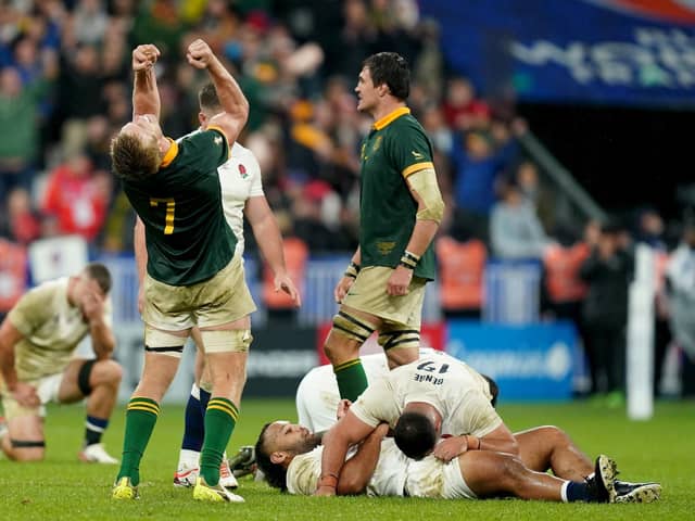THE HIGHS AND THE LOWS: South Africa's Pieter-Steph du Toit (centre) celebrates at the final whistle after edging out England in their World Cup semi-final at the on Saturday night. Stade de France Picture: David Davies/PA
