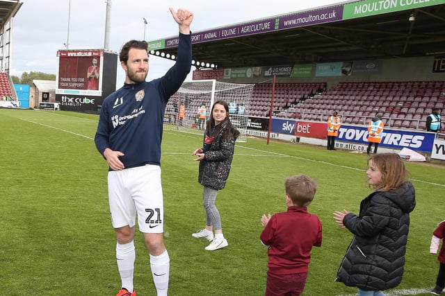 John-Joe O'Toole of Northampton Town waves to the crowd on a lap of honour at the end of Sky Bet League Two match between Northampton Town and Yeovil Town at PTS Academy Stadium on April 27, 2019.