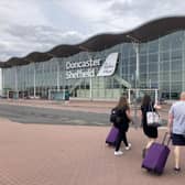 Passengers head to the check-in desk on their way into Doncaster Sheffield Airport.