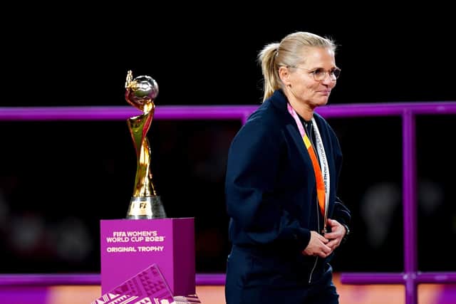 England head coach Sarina Wiegman walks past the trophy after being presented with her runner up medal at the end of the FIFA Women's World Cup final match at Stadium Australia (Picture:: Zac Goodwin/PA Wire)