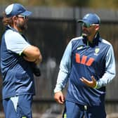 Nathan Lyon, right, in conversation with Australia coach Dan Vettori ahead of the first Test in Perth. Photo by Paul Kane/Getty Images.