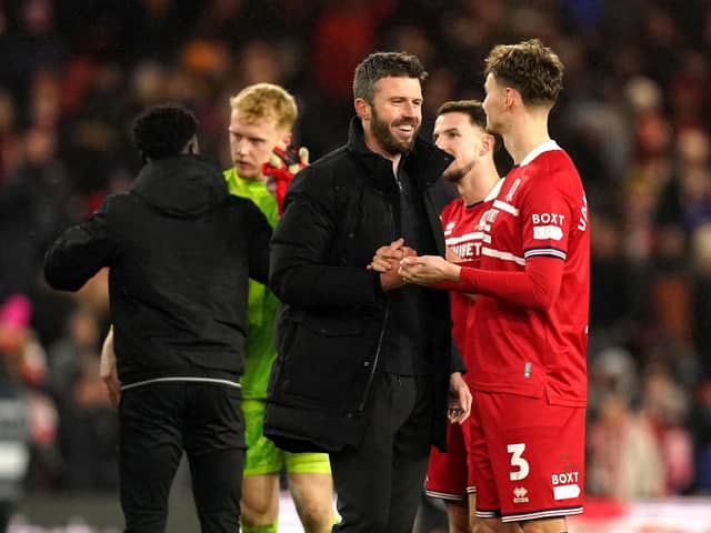 Middlesbrough manager Michael Carrick with Rav van den Berg (right) after the final whistle in the Carabao Cup semi final first leg match against Chelsea at the Riverside Stadium in January. Picture: Martin Rickett/PA Wire.