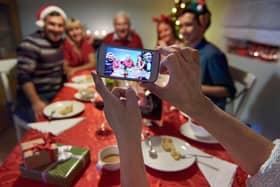 A family posing for a photo together after Christmas dinner. PIC: PA Photo/thinkstockphotos.