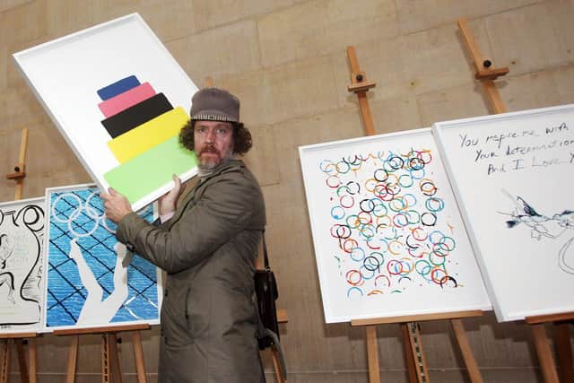 Artist Martin Creed with his poster, Work No. 1273,  that has been unveiled as one of the official posters for the London Olympics. Picture: Lewis Whyld/PA Wire