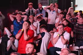 Fans at Winter Gardens Blackpool, reacting to the missed penalty by Harry Kane as they watch a screening of the FIFA World Cup 2022 Quarter Final match between England and France.