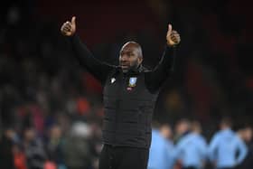 Hard-earned point: Darren Moore, manager of Sheffield Wednesday, acknowledges the fans following a vital 2-2 draw at Ipswich Town. (Picture: Mike Hewitt/Getty Images)