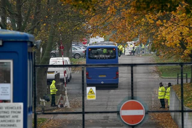 A coach carrying people thought to be migrants arrives at the Manston immigration short-term holding facility in Thanet, Kent. PIC: PA