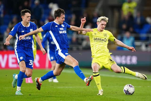 Huddersfield Town's Jack Rudoni and Cardiff City's Ryan Wintle battle for the ball (Picture: Davies/PA Wire)