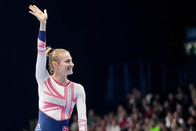 Champion: Bryony Page acknowledges the support of the home crowd after winning world championship gold. “It’s nice to hear the cheer before I even got onto the trampoline to compete," she says.