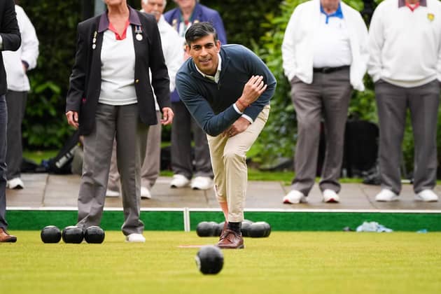 Prime Minister Rishi Sunak plays a game of bowls. PIC: Aaron Chown/PA Wire
