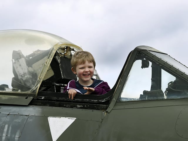 Four year old Edward Clark from Northallerton in a Meteor during the open cockpit event at the Yorkshire Air Museum, near York.