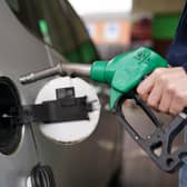 A person filling a car with fuel. PIC: Joe Giddens/PA Wire