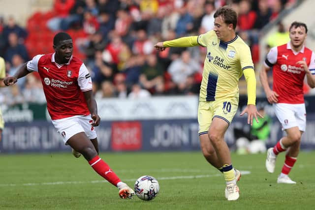 MIDDLE MAN: Rotherham United's Christ Tiehi (left) and Preston North End's Mads Frokjaer battle for the ball