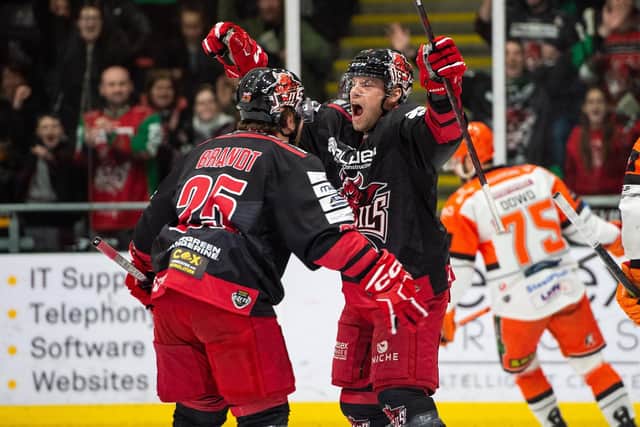 STRIKE ONE: Ben Davies (right) celebrates putting Cardiff Devils 1-0 up against Sheffield Steelers at Ice Arena Wales. Picture courtesy of James Assinder/EIHL Media.