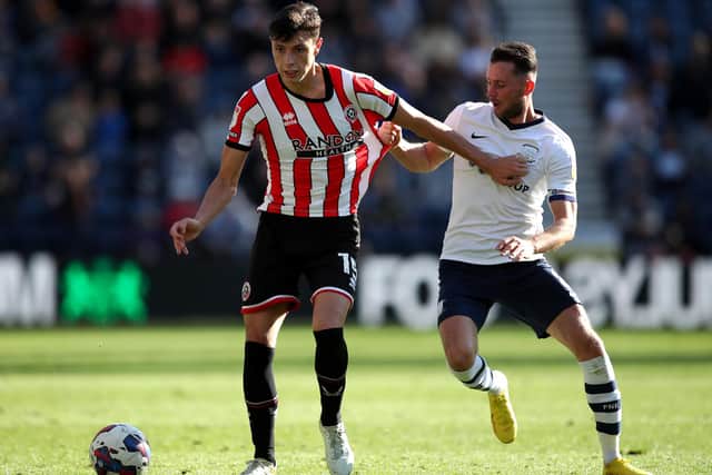 Sheffield United's Anel Ahmedhodzic (left) and Preston North End's Alan Browne battle for the ball during the Sky Bet Championship match at Deepdale Stadium, Preston during the Blades' 2-0 win on Saturday. Picture: Isaac Parkin/PA Wire.