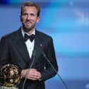 England's Harry Kane wins the player of the year trophy during the Ballon d'Or ceremony. PIC: AP Photo/Kin Cheung