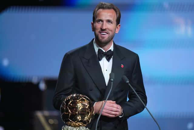 England's Harry Kane wins the player of the year trophy during the Ballon d'Or ceremony. PIC: AP Photo/Kin Cheung