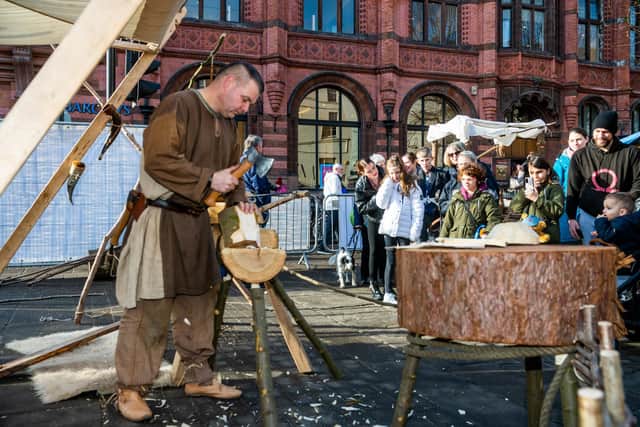 Jon Arey (Viking Name), Trigvi Treehammer, demonstrating his woodcarving skills. (Pic credit: James Hardisty)