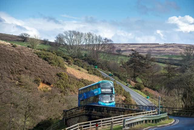 A Coastliner bus approaches Goathland which is on the route of Britain's most scenic bus route, has been saved from the axe with a sudden rush of tourists taking advantage of the £2 fares. Picture by Yorkshire Post Photographer Bruce Rollinson