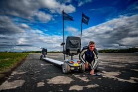The Creator of the World's Fastest Shed, Kevin Nicks, form Oxfordshire, has set another new Guinness world record (GWR) record for riding the longest mobility scooter over 22ft 3 inches long at the Straightliners automotive records event held at Elvington Airfield, Yorkshire.