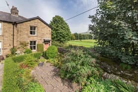 The three-bedroom, extended cottage is in an enviable location in the sought-after village of Settle.