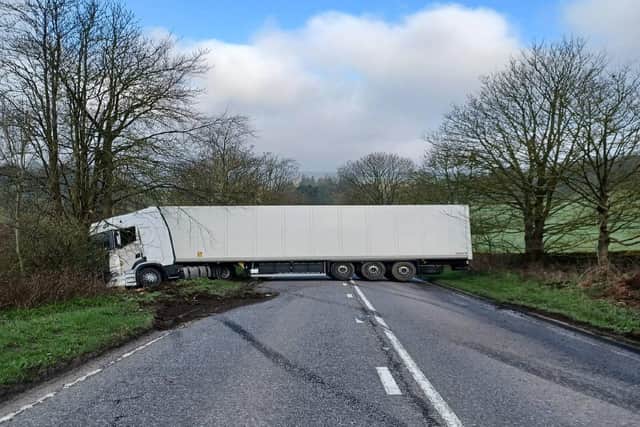 A HGV driver who overturned and blocked a road in a small Yorkshire village was almost three times over the legal limit for alcohol, police said. Photo: North Yorkshire Police