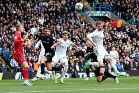 CHANCE: Patrick Bamford of Leeds United heads wide under pressure from Kyle McFadzean