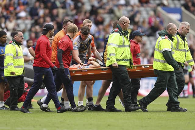 Jack Croft of Wakefield Trinity is stretchered off with an injury. (Photo: Paul Currie/SWpix.com)