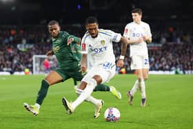 LEEDS, ENGLAND - JANUARY 27: Jaidon Anthony of Leeds United battles for possession with Bali Mumba of Plymouth Argyle during the Emirates FA Cup Fourth Round match between Leeds United and Plymouth Argyle at Elland Road on January 27, 2024 in Leeds, England. (Photo by Matt McNulty/Getty Images)