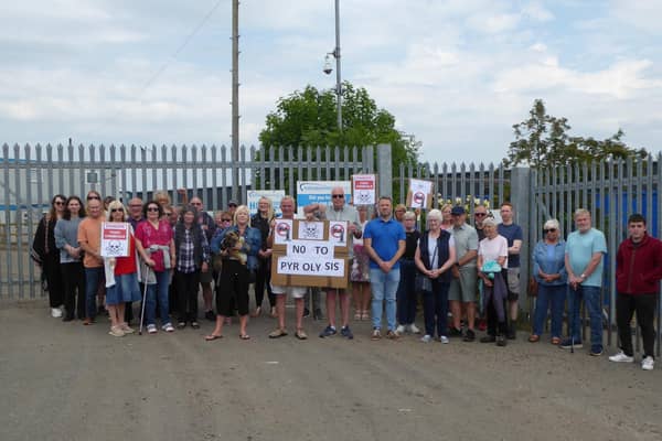 A group of Worksop residents are campaigning to block the proposed The Shireoaks Plastics Recycling Centre & Energy Recovery Facility. Image shows residents outside the proposed site with local MP Brendan Clarke-Smith