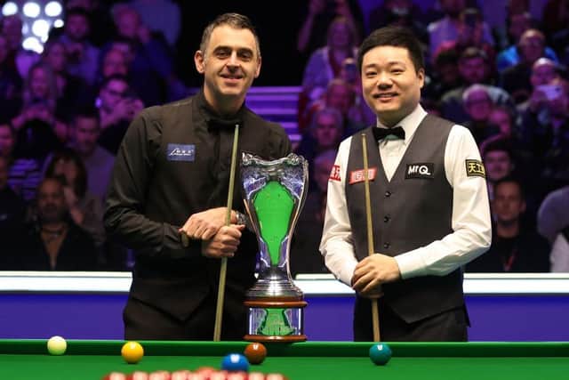 Ronnie O'Sullivan of England and Ding Junhui (R) of China pose for a photo before their Final match on Day Nine of the MrQ UK Snooker Championship 2023 at York Barbican on December 03, 2023 in York, England. (Photo by George Wood/Getty Images)