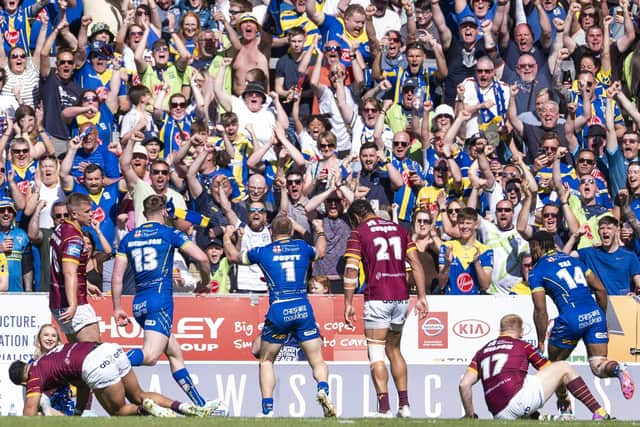 Matt Dufty celebrates a try in front of the Warrington fans. (Photo: Olly Hassell/SWpix.com)