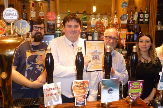 The Gardeners Rest, Neepsend Lane, Sheffield, won Pub of the Year for Sheffield North and overall winner for Pub of the Year for Sheffield and District CAMRA in 2019. Presenting the award to staff is Glyn Mansell, third left, chairman of Sheffield CAMRA