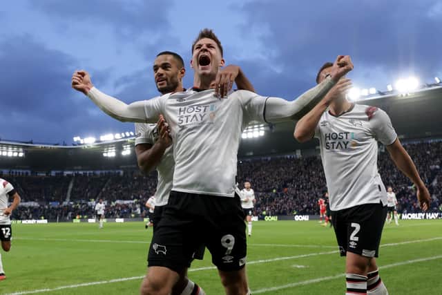 HOME JOY: Derby County's James Collins (centre) celebrates scoring their side's third goal against Barnsley at Pride Park. Picture: Barrington Coombs/PA