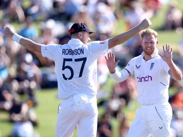 TAURANGA, NEW ZEALAND - FEBRUARY 17: Ben Stokes of England celebrates his wicked of Devon Conway of New Zealand with Ollie Robinson during day two of the First Test match in the series between the New Zealand Blackcaps and England at the Bay Oval on February 17, 2023 in Mount Maunganui, New Zealand. (Photo by Phil Walter/Getty Images)