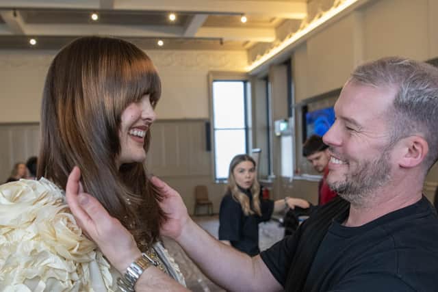 Robert Eaton, creative director of Russell Eaton, with model earlier this year. He says ghd transformed how hairdressers worked. Photograph by Tony Johnson.