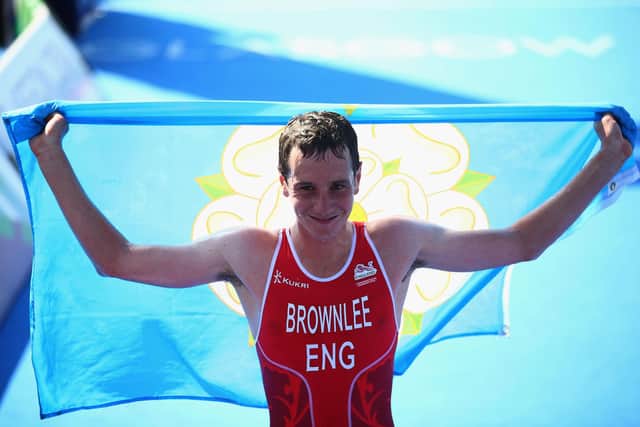 Alistair Brownlee of England crosses the line to win gold in the Men's Triathlon at Strathclyde Country Park during day one of the Glasgow 2014 Commonwealth Games on July 24, 2014 (Picture: Julian Finney/Getty Images)