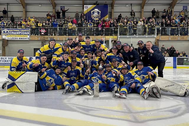CHAMPIONS: Leeds Knights players and staff celebrate with the NIHL National championship trophy at Elland Road Ice Arena. Picture courtesy of Leeds Knights.